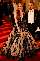 Damen tragen auf dem Wiener Opernball ein langes Abendkleid, für Herren herrscht Frackzwang.